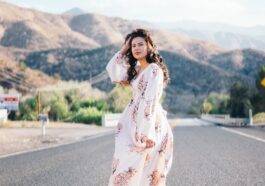 woman standing in the middle of the road